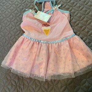 Dog outfits: Pink Ice Cream Tutu Dress & two tutus.